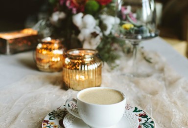 A teacup on a decorated table
