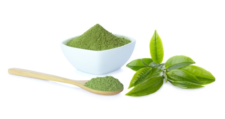 Powdered green tea in a cup