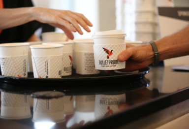 A sampler tray of paper coffee cups