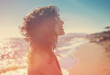Happy woman in the sun