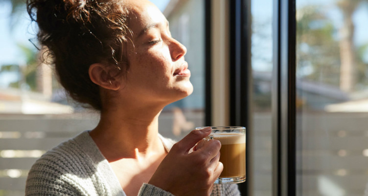 Woman drinking Bulletproof Coffee