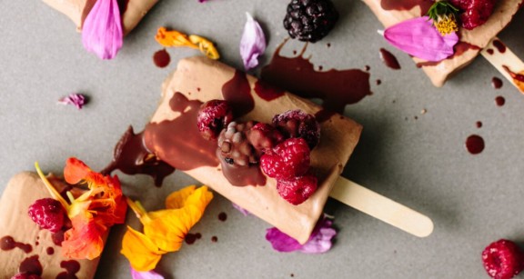 An ice cream bar decorated with berries