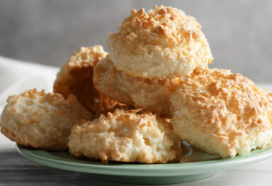 Plate stacked full of homemade paleo biscuits