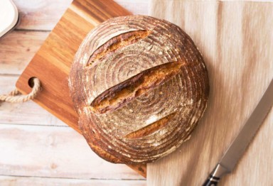 A loaf of bread on a cutting board