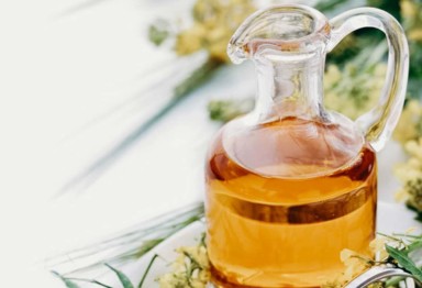 Glass jar of canola oil