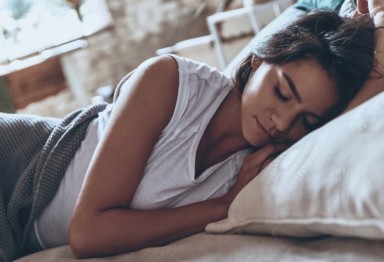 Woman sleeping in bed