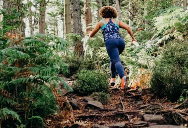 women run and bike faster after taking newly developed supplement_woman running in woods