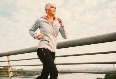 Mature woman running outdoors