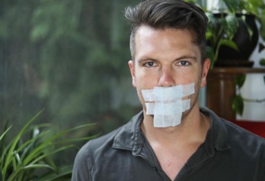 Man wearing mouth tape