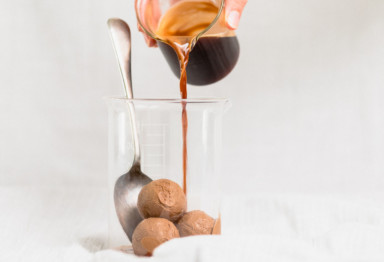 Espresso pouring over keto ice cream