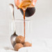 Espresso pouring over keto ice cream
