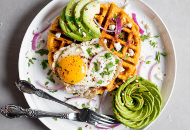 Gluten-free sweet potato waffle with eggs and avocado