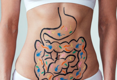 Woman with digestion outline on stomach