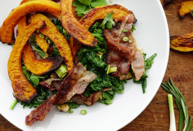 This warm fall salad brings out the best flavors for chilly weather, thanks to a savory combo of roasted squash, crisp bacon, and kale.
