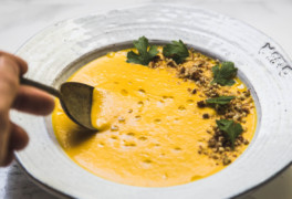 This paleo and Whole30 carrot soup blends tender carrots with sage and coconut milk for a sweet, buttery soup with just minutes of prep time.