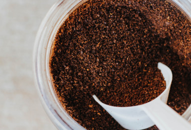 Scoop of ground coffee beans