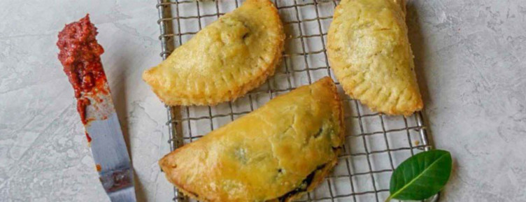Three spinach empanadas