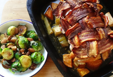 Bacon wrapped roasted turkey breast and brussels sprouts