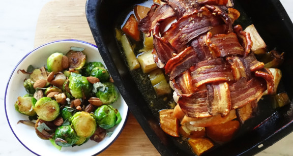 Bacon wrapped roasted turkey breast and brussels sprouts