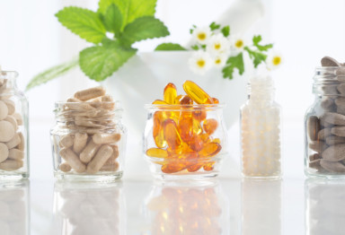 Glass jars full of supplements