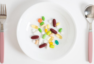Supplements on empty plate