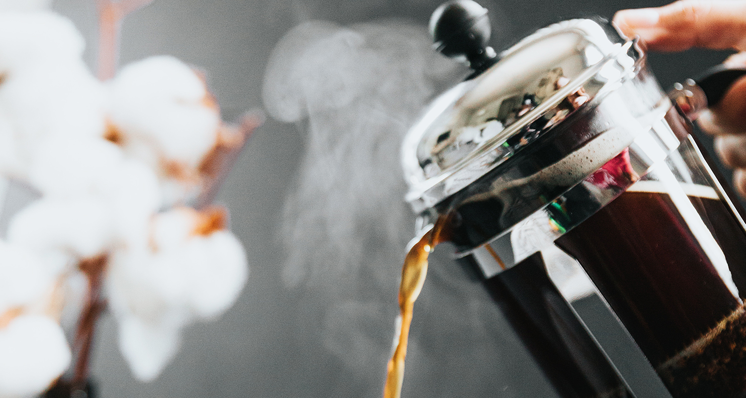 french press pouring coffee