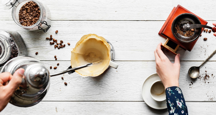 Person brewing coffee with pourover method