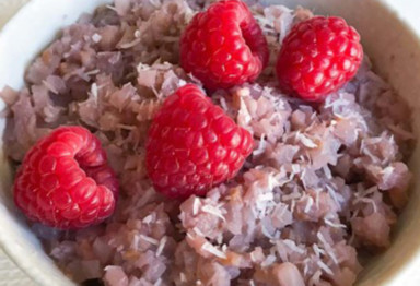 Bowl of keto noatmeam and raspberries