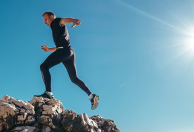 Man hiking in sunlight
