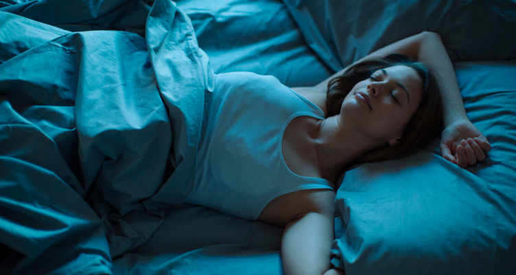 Woman sleeping in bed