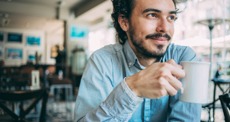 Man enjoying a cup of coffee