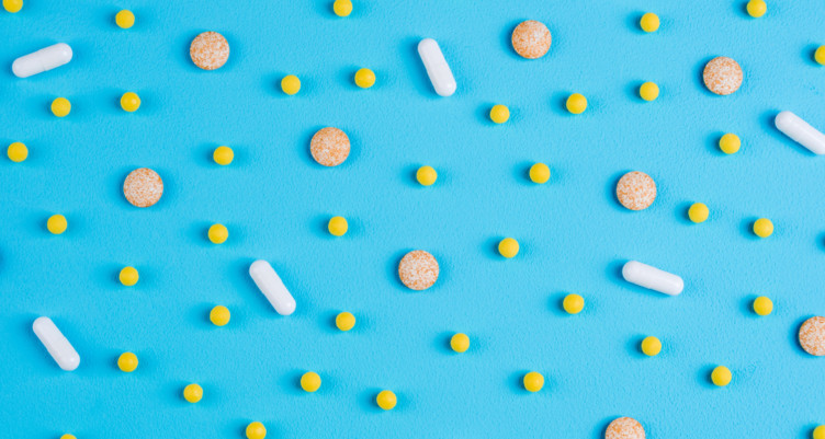 Pills on blue background