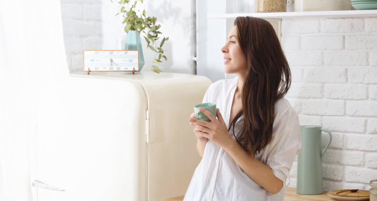 Woman looking out window