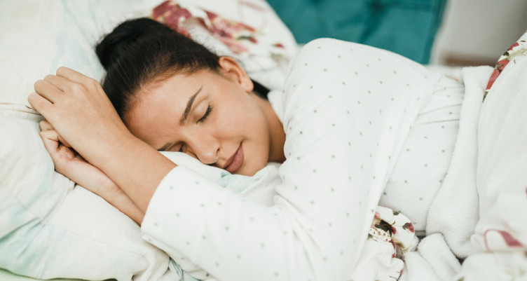 Woman sleeping in bed