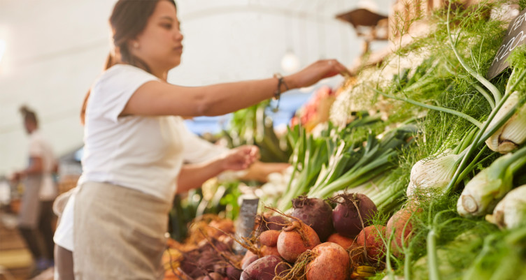 Woman shopping for fresh produce