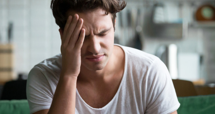 Man feeling ill because of leaky gut syndrome
