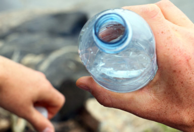 Man holding water bottle
