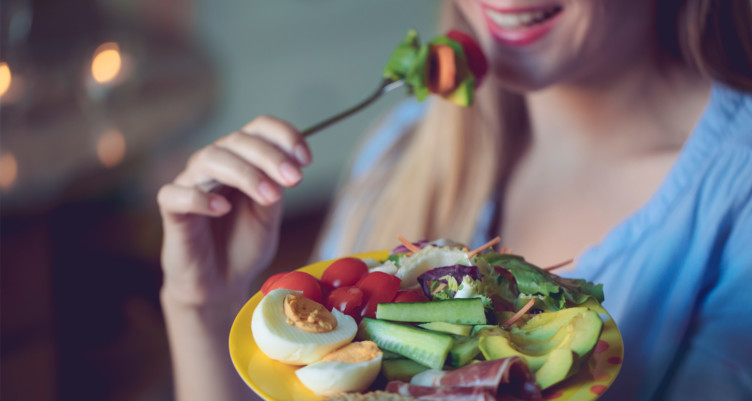 woman eating a keto meal