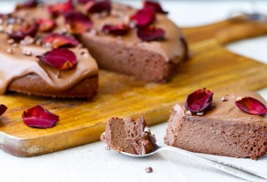 A sliced cake on a cutting board