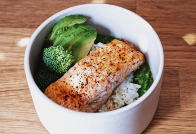 This protein bowl recipe loads your meal with fresh veggies, wild-caught salmon, and Brain Octane Oil to keep you fueled -- all with 20 minutes of prep.
