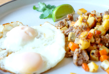 A breakfast plate of eggs and hash