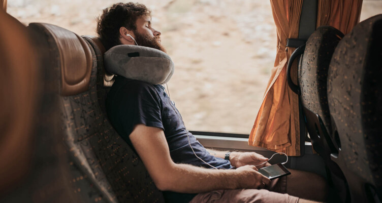 Man sleeping on train