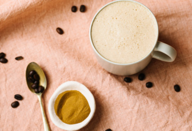 Cup of Bulletproof Coffee next to powder