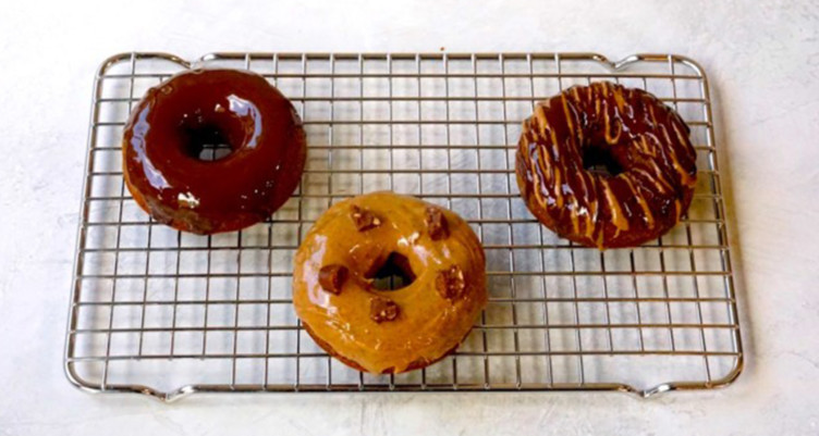 Gluten-free pumpkin spice doughnuts on wire rack