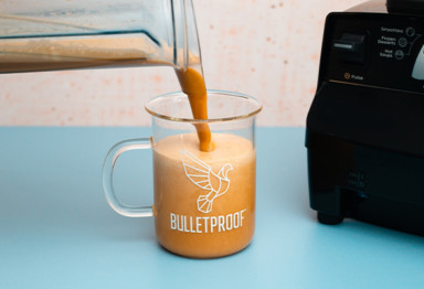 Prebiotic Bulletproof Coffee with Collagen Protein being poured into mug