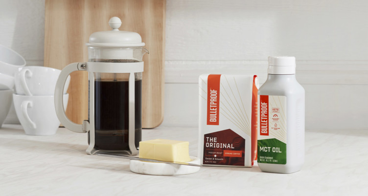 Bulletproof Coffee ingredients, butter and a French press