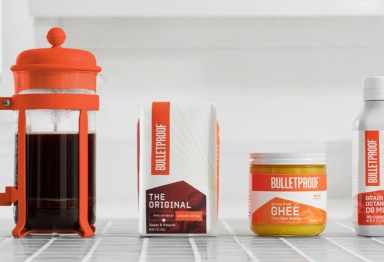 Bulletproof Coffee ingredients next to French press