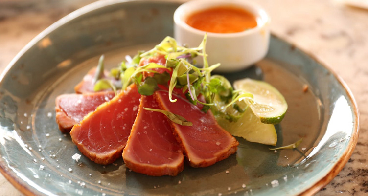 Ahi tuna sashimi on gray plate