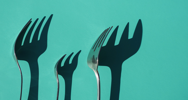 Forks on blue background
