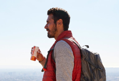 A man hiking and drinking Bulletproof Cold Brew Latte